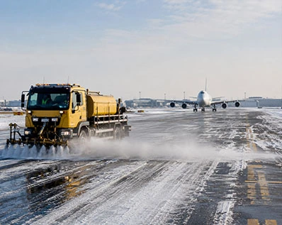 Snow melting liquid potassium acetate