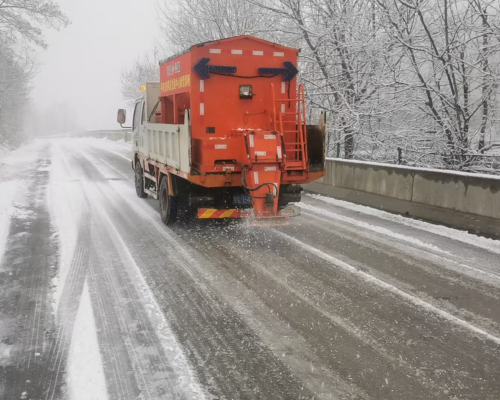 Application of special series of acetate products for de-icing and snow-melting of metal bridge in cold region